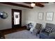 Cozy living room with comfortable seating, decorative wall art and stylish rug at 6041 Dewey Ave, Indianapolis, IN 46219