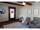 Cozy living room with comfortable seating, decorative wall art and stylish rug at 6041 Dewey Ave, Indianapolis, IN 46219