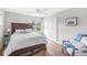 Cozy bedroom with hardwood floors, natural light, and ample closet space at 671 Spring Hills Dr, Zionsville, IN 46077