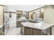 Modern kitchen featuring stainless steel appliances, a stylish backsplash, and sleek countertops at 671 Spring Hills Dr, Zionsville, IN 46077