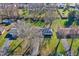 Aerial view of the home, highlighting its location in a tree-lined neighborhood with well-maintained lawns at 7133 Mc Lain Dr, Indianapolis, IN 46217