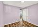 Bedroom with door to hallway and a window at 7133 Mc Lain Dr, Indianapolis, IN 46217