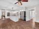 Modern kitchen with white cabinetry, stainless steel appliances, and a spacious island at 7540 S Mooresville Rd, Indianapolis, IN 46221