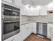 Modern kitchen featuring stainless steel appliances and stylish countertops at 7540 S Mooresville Rd, Indianapolis, IN 46221