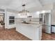 Modern kitchen with white cabinets, granite countertops, and stainless steel appliances at 7540 S Mooresville Rd, Indianapolis, IN 46221