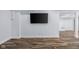 Finished basement showcasing a mounted flatscreen tv at 7845 W Hillside Dr, Columbus, IN 47201