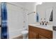 Bathroom featuring vanity and tub with shower at 7845 W Hillside Dr, Columbus, IN 47201
