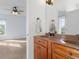 Bathroom featuring dual sink vanity and en suite at 7845 W Hillside Dr, Columbus, IN 47201