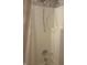 A basic, functional shower stall with a white surround and simple fixtures at 805 Stewart Rd, Anderson, IN 46012