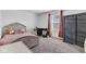 Spare bedroom with window, closet, and desk area at 8153 Fivespot Ln, Plainfield, IN 46168