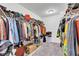 Spacious walk-in closet with ample storage racks and shelves for organization at 8153 Fivespot Ln, Plainfield, IN 46168