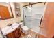 Updated bathroom with sliding glass shower doors and vanity at 868 Glendale Dr, Franklin, IN 46131