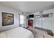 Bright bedroom with large window, closet, and hardwood floors at 868 Glendale Dr, Franklin, IN 46131