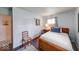 Cozy bedroom with hardwood floors, white walls, and a comfortable, neutral-toned bed at 868 Glendale Dr, Franklin, IN 46131
