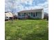 Beautiful single-story home with a well-kept lawn, tidy landscaping, and updated windows at 868 Glendale Dr, Franklin, IN 46131