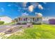 Charming single-story home with well-manicured lawn and beautiful landscaping at 868 Glendale Dr, Franklin, IN 46131