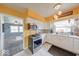 The kitchen features white cabinets, stainless steel appliances, and tile flooring at 868 Glendale Dr, Franklin, IN 46131