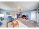 Cozy living room with carpet, a ceiling fan, and blue walls at 868 Glendale Dr, Franklin, IN 46131