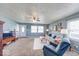 Inviting living room features large windows, plush carpet, and comfortable seating at 868 Glendale Dr, Franklin, IN 46131