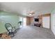Cozy living room with brick accent wall and sliding glass doors to the outside at 868 Glendale Dr, Franklin, IN 46131