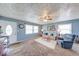 Inviting living room features large windows, plush carpet, and comfortable seating at 868 Glendale Dr, Franklin, IN 46131