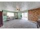Bright, spacious living room featuring sliding doors to a patio at 868 Glendale Dr, Franklin, IN 46131