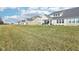 Spacious backyard showcasing the neighborhood, ideal for recreation and outdoor activities at 887 Tuxedo Dr, Westfield, IN 46074