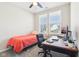 Bedroom with desk, neutral colors, ceiling fan, and lots of natural light at 887 Tuxedo Dr, Westfield, IN 46074