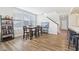 Dining area featuring natural light, wood floors, and staircase at 887 Tuxedo Dr, Westfield, IN 46074