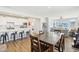 Open kitchen featuring white cabinets, stainless steel appliances, and breakfast bar at 887 Tuxedo Dr, Westfield, IN 46074