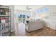 Spacious living room with wood floors, large windows, and stylish decor at 887 Tuxedo Dr, Westfield, IN 46074