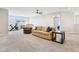 Spacious living area with comfortable seating, neutral colors, and workout space at 887 Tuxedo Dr, Westfield, IN 46074