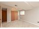 Finished basement area with a window for natural light and a storage closet, ideal for a home office at 9462 Bent Brook Dr, Indianapolis, IN 46250