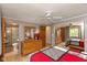 Bright bedroom with an adjacent bathroom and closet with mirrored doors adding depth and light at 9462 Bent Brook Dr, Indianapolis, IN 46250