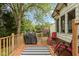Inviting deck with outdoor seating and a grill, perfect for entertaining and enjoying the outdoors at 9462 Bent Brook Dr, Indianapolis, IN 46250