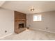 Bright living room showcases a brick fireplace and cozy carpet, creating an inviting atmosphere at 9462 Bent Brook Dr, Indianapolis, IN 46250