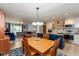 Open-concept living space with a dining area, kitchen, and comfortable seating at 9462 Bent Brook Dr, Indianapolis, IN 46250
