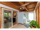 Bright sunroom with sliding glass doors and wood plank ceiling boasts lots of natural light at 9462 Bent Brook Dr, Indianapolis, IN 46250