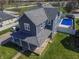 Beautiful two-story home with in-ground pool and well-maintained lawn at 97 N Maple St, Pittsboro, IN 46167