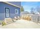 Backyard featuring a concrete patio, mature trees, and seating area at 97 N Maple St, Pittsboro, IN 46167