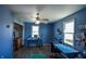 Bright bedroom featuring ample natural light, a ceiling fan, and versatile workspace, perfect for a home office at 97 N Maple St, Pittsboro, IN 46167