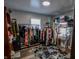 Spacious walk-in closet with organized shelving and clothing racks at 97 N Maple St, Pittsboro, IN 46167