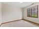 Bright bedroom with a large window offering plenty of natural light at 10673 Rolling Springs Dr, Indianapolis, IN 46234