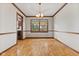 Bright dining room with hardwood floors and natural light at 10673 Rolling Springs Dr, Indianapolis, IN 46234