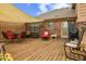 Outdoor patio with dining table, seating, and grill area, providing a relaxing outdoor experience at 10673 Rolling Springs Dr, Indianapolis, IN 46234
