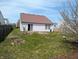 Backyard with new grass and small trees at 11403 Fairweather Pl, Indianapolis, IN 46229