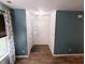 Inviting entryway featuring stylish paint, durable wood floors, and ample natural light at 11403 Fairweather Pl, Indianapolis, IN 46229