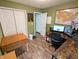 Office with laminate floors, United States map on wall, and desk with dual monitors at 11403 Fairweather Pl, Indianapolis, IN 46229