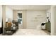 Bright Bedroom featuring modern décor, a crib, a rug, and natural light at 11640 Aubrey Ln, Fishers, IN 46040