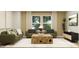 Comfortable living room with natural textures, comfortable seating, and a decorative coffee table at 11640 Aubrey Ln, Fishers, IN 46040